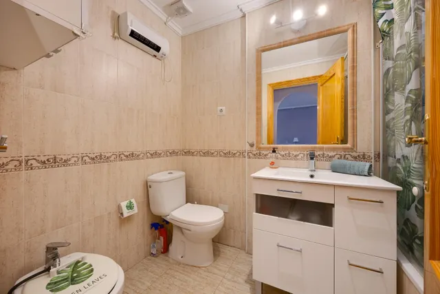 Bungalow de dos dormitorios y piscina comunitaria en Orihuela Costa — 6