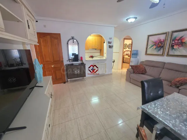 Piso planta baja con dos terrazas, piscina comunitaria y par - foto 5