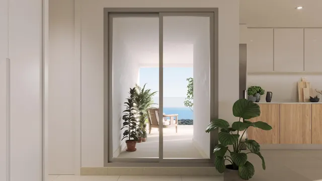 PLANTA BAJA CON JARDÍN Y TERRAZA CUBIERTA Y DESCUBIERTA, ORIENTADA AL SUR Y CON VISTAS AL MAR. — 10