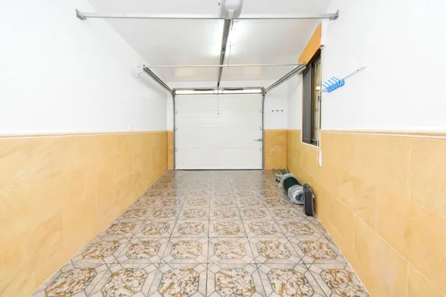 VIVIENDA DE PLANTA BAJA CON SOLARIUM Y COCHERA — 30
