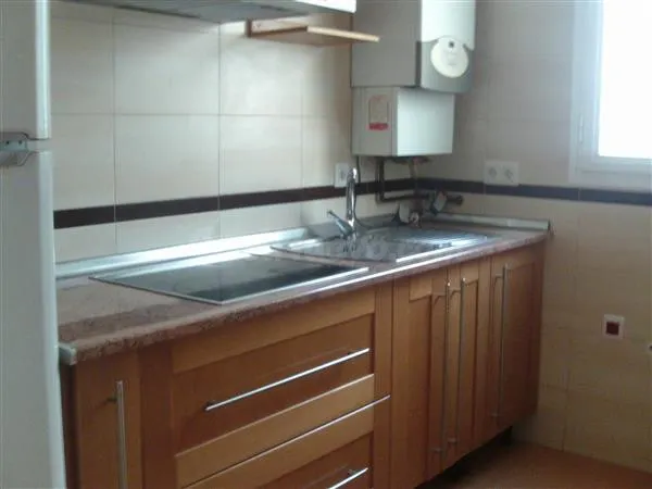 Ático de un dormitorio con amplia terraza, cocina independie