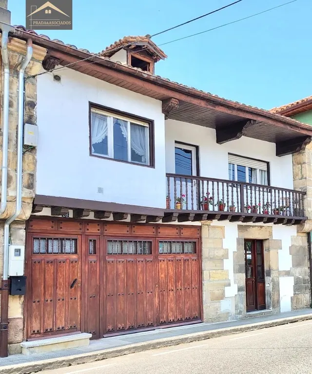 CASA Y TERRENO EN ARENAS DE IGUÑA. - foto 2