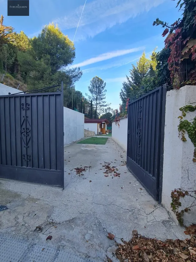 Parcela con una casita de madera en Cumbres Verdes. — 27