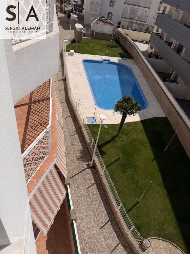 APARTAMENTO CON GARAJE Y PISCINA — 14