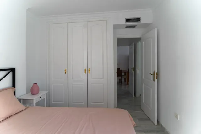 APARTAMENTO EN ALHAURIN GOLF CON TERRAZA CON BUENAS VISTAS, PARKING Y PISCINA Y JARDÍN COMUNITARIO — 21