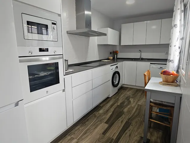 Casa practicamente nueva, toda en una planta, muy buenas calidades y con terraza de 20 m2 — 31
