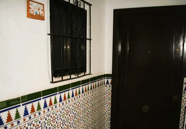 CASA DE VECINOS CON 8 APARTAMENTOS — 14