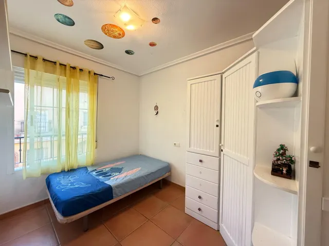 Bungalow con jardín privado, garaje y piscina comunitaria en Santa Pola — 16