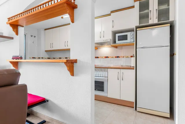 Apartamento de 2 dormitorios 2 baños en playa flamenca (orihuela costa) — 12
