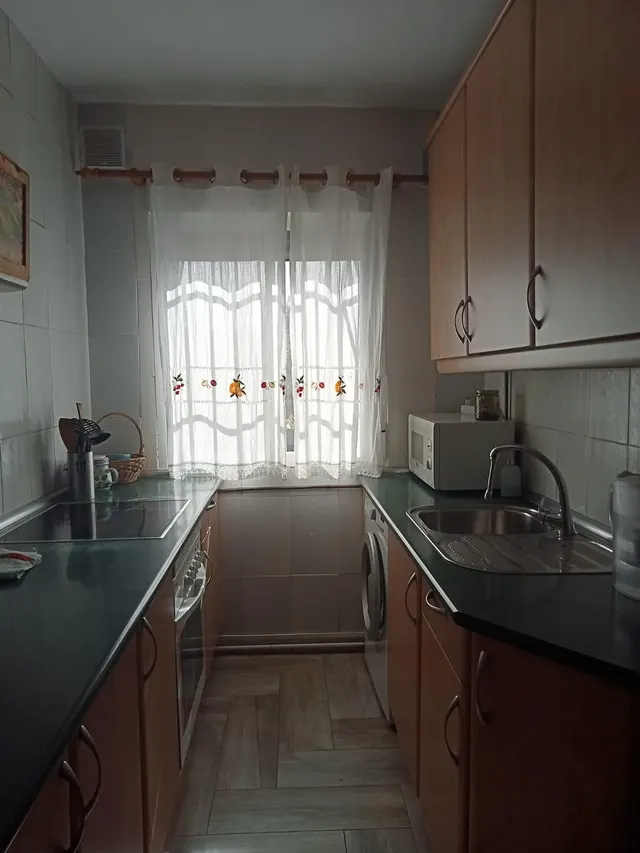 Chalet independiente de una planta con solárium, trastero y jardín consolidado — 7