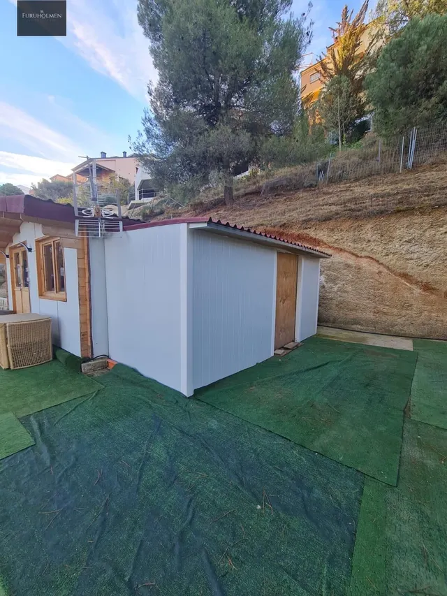 Parcela con una casita de madera en Cumbres Verdes. — 17