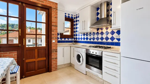 PISO CON GARAJE CERRADO EN EL CENTRO DE COMILLAS — 13