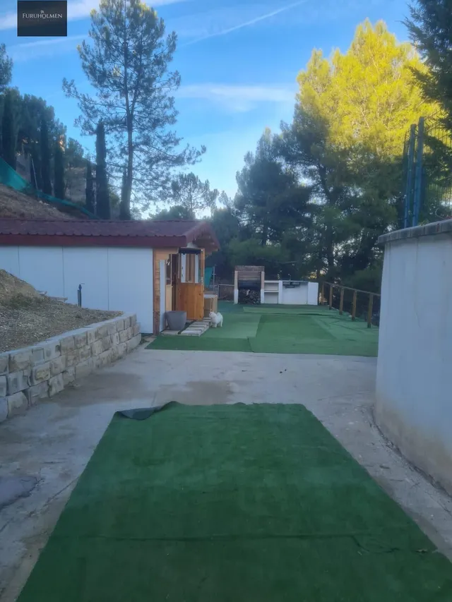 Parcela con una casita de madera en Cumbres Verdes. — 26