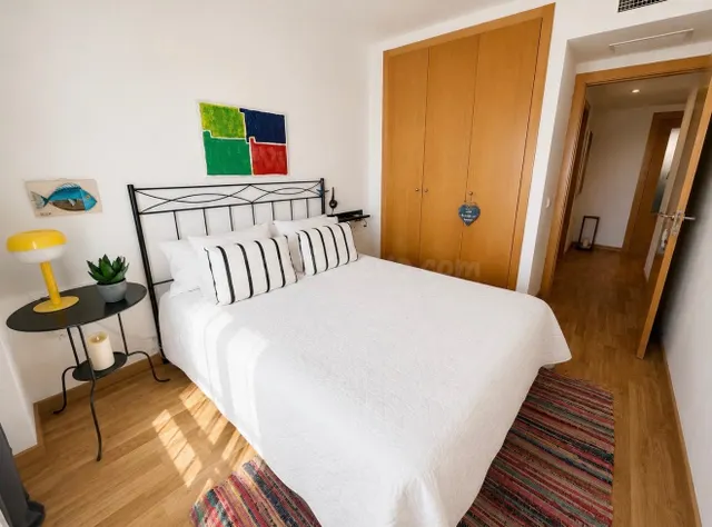 Planta baja con terraza y piscina comunitaria, en CAMPOS — 14