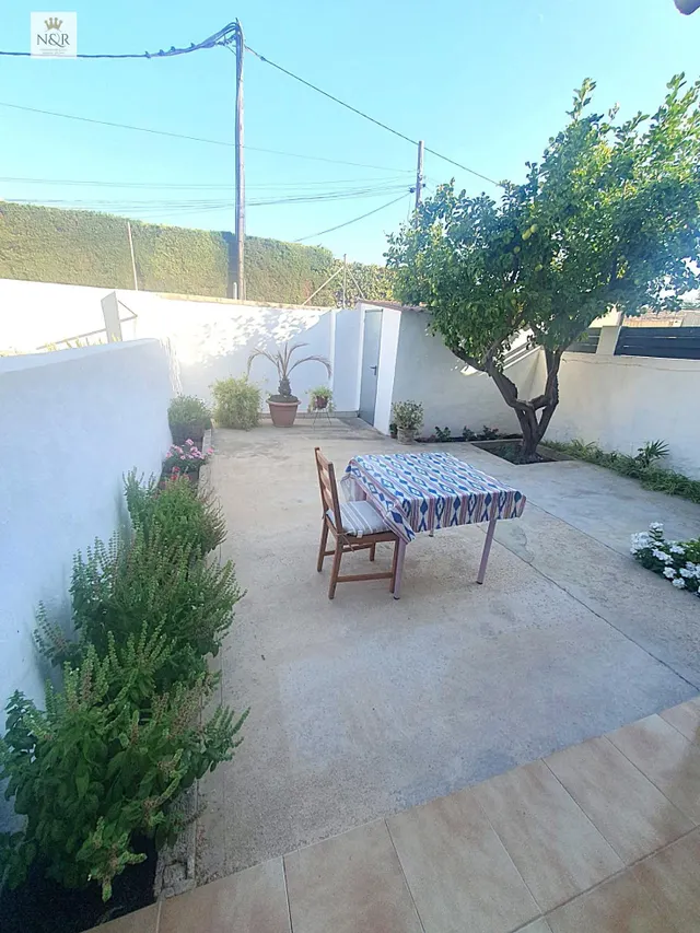 CASA ADOSADA CON TERRAZA Y PARKING EXTERIOR EN PALMA - foto 3