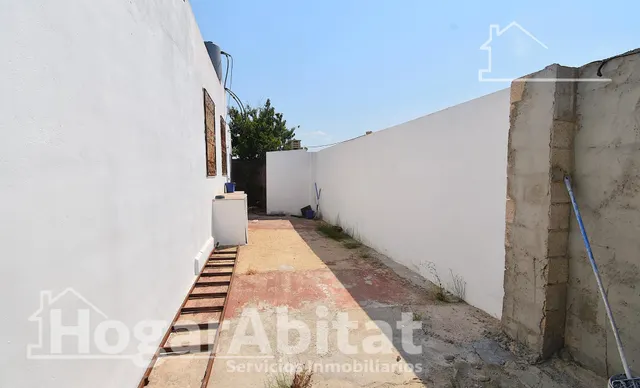 GRAN PARCELA CON VIVIENDA Y AMPLIA TERRAZA — 29
