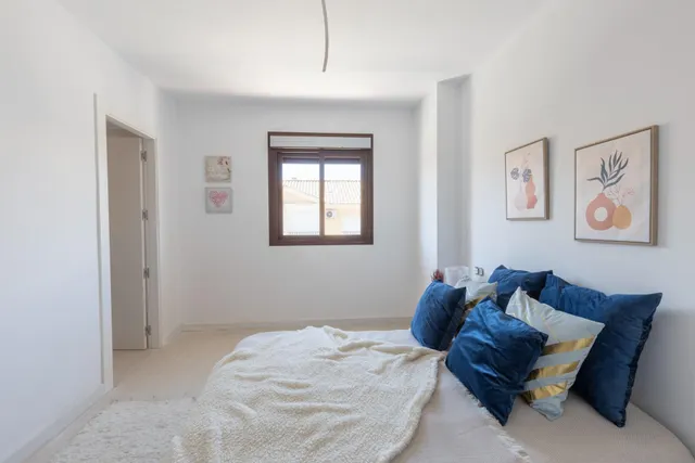 Espectacular casa adosasa de obra nueva — 23