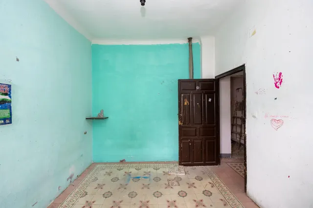 CONJUNTO DE PISOS Y PLANTA BAJA EN GRANADA CON 490 m2 — 12