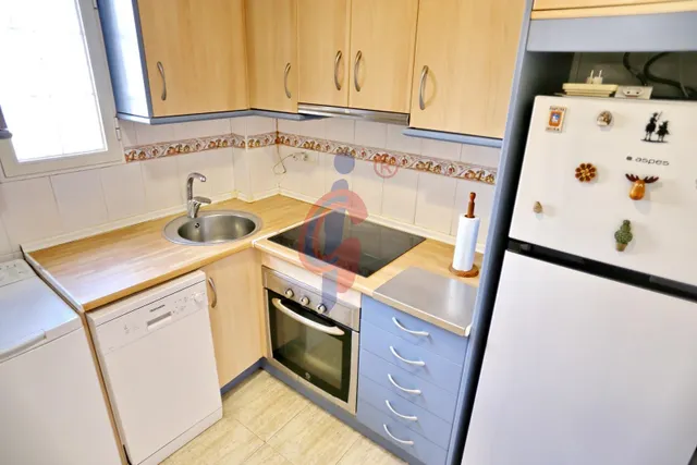 Planta baja en venta en el centro de Guardamar del Segura con gran terraza privada y piscina comunitaria — 13
