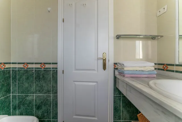 APARTAMENTO EN ALHAURIN GOLF CON TERRAZA CON BUENAS VISTAS, PARKING Y PISCINA Y JARDÍN COMUNITARIO — 19