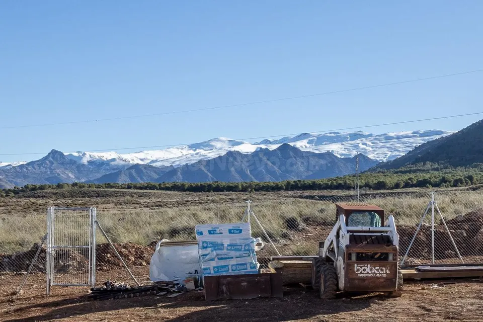 Oportunidad de Inversión en Dilar: Parcela en Urbanización Cañadas del Parque
