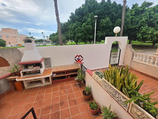 Piso planta baja con dos terrazas, piscina comunitaria y parking en Los Narejos — 28