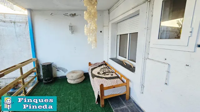 CASA PLANTA BAJA CON 2 VECINOS CON JARDÍN — 16