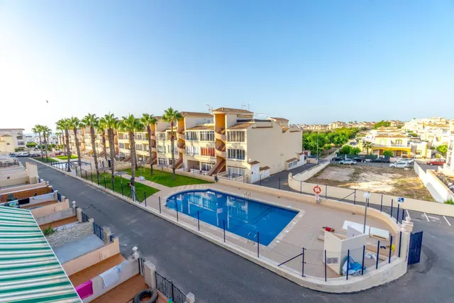 Villas Don Sancho V – Coqueto apartamento en planta baja con jardín, terrazas y piscina comunitaria. 2 dormitorios — 30