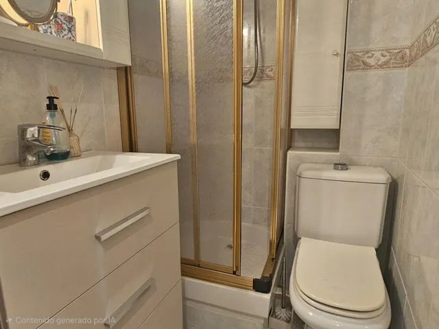Piso de 4 dormitorios con plaza de garaje en San Basilio, con terraza de 20 m2 anexa al trastero en la cubierta. — 42