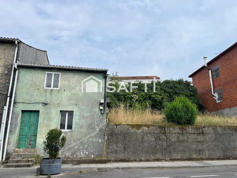 Casa de piedra para reformar con terreno
