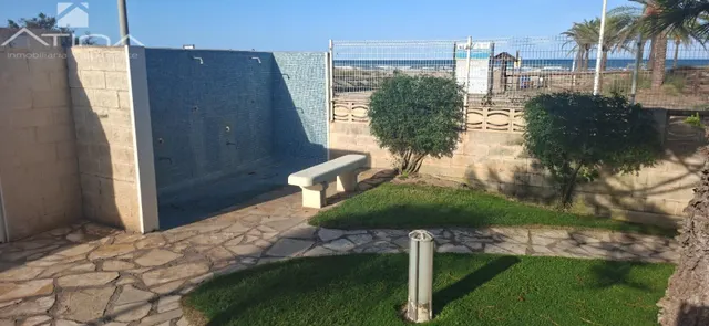 Ático de lujo en Playa de Gandia: vistas al mar, terraza panorámica y acceso directo a la playa en Residencial Aiguablava. — 9