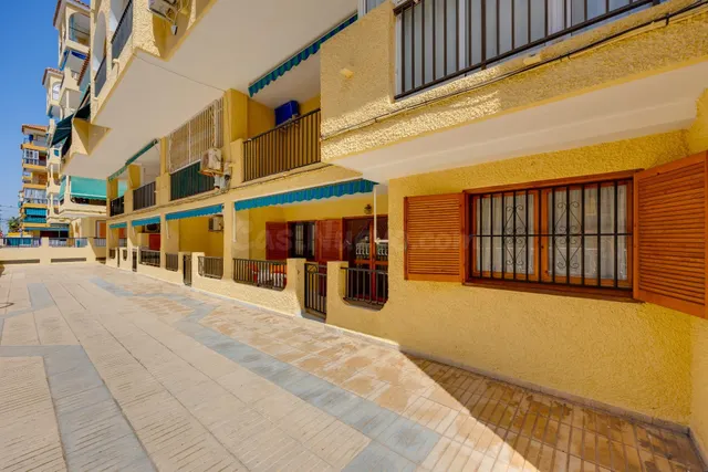 Planta baja de 2 dormitorios en Viñamar II con piscina, a 200 m de la Playa de La Mata — 25