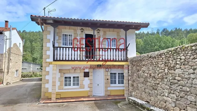 CASA COMPLETAMENTE REFORMADA EN ARENAS DE IGUÑA. — 2