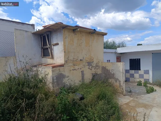 VIVIENDA RÚSTICA A REHABILITAR CON TERRENO — 12