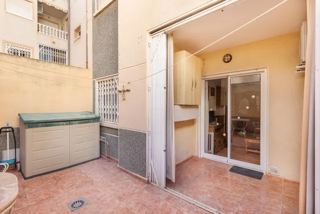 Acogedor piso en planta baja con piscina comunitaria — 21