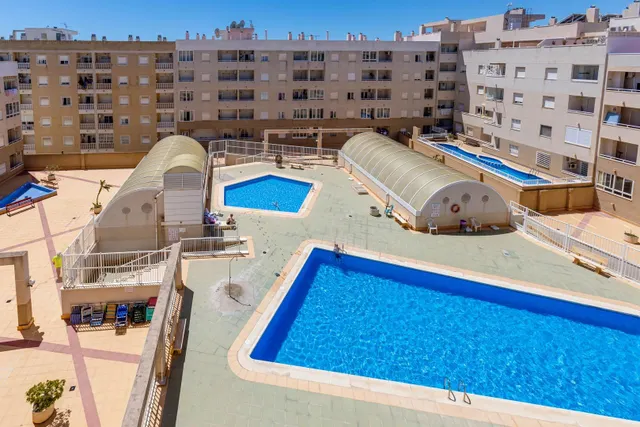 APARTAMENTO DE DOS DORMITORIOS CON VISTAS A LA LAGUNA ROSA Y CON PISCINA COMUNITARIA — 41