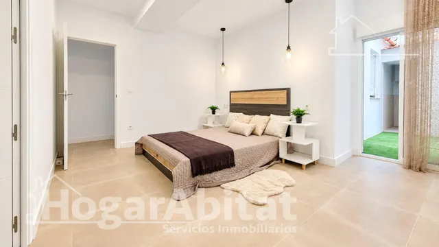 Luz, amplitud y excelentes calidades en esta moderna planta baja reformada con terraza — 11