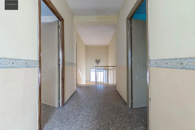 SE VENDE CASA CON UNA PARCELA DE 518 m2 (EN EL CENTRO DE LOS OGÍJARES). — 34
