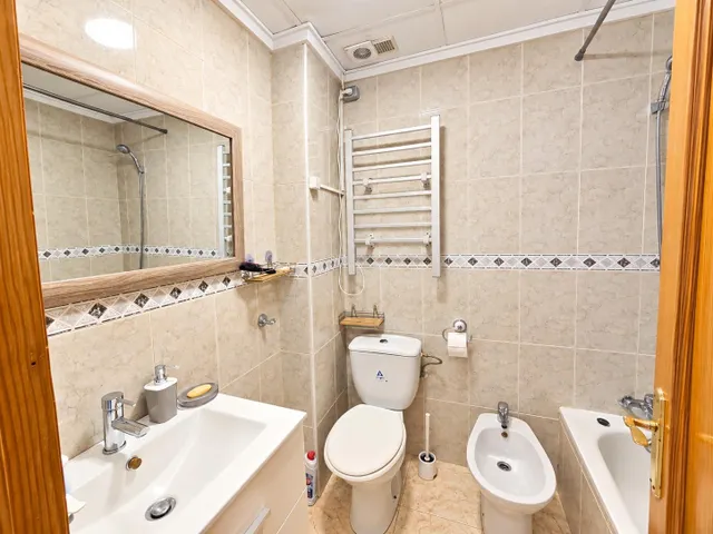 PLANTA BAJA - 2 DORMITORIOS - 2 BAÑOS - 87M2 - PATIO — 16