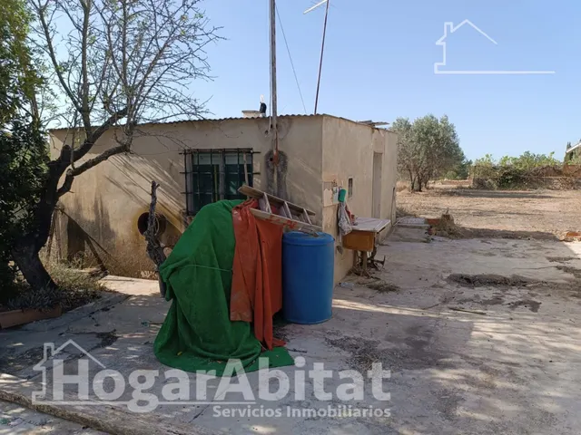 OPORTUNIDAD DE PROPIEDAD RUSTICA CON TERRENO Y PISCINA — 36