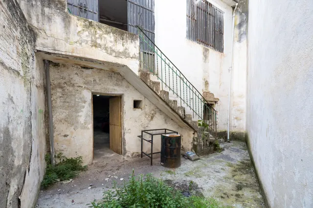 CONJUNTO DE PISOS Y PLANTA BAJA EN GRANADA CON 490 m2 — 16