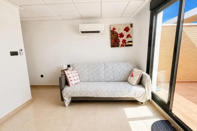 Ático dúplex con vistas frontales al mar y amplio solárium en Guardamar del Segura — 22