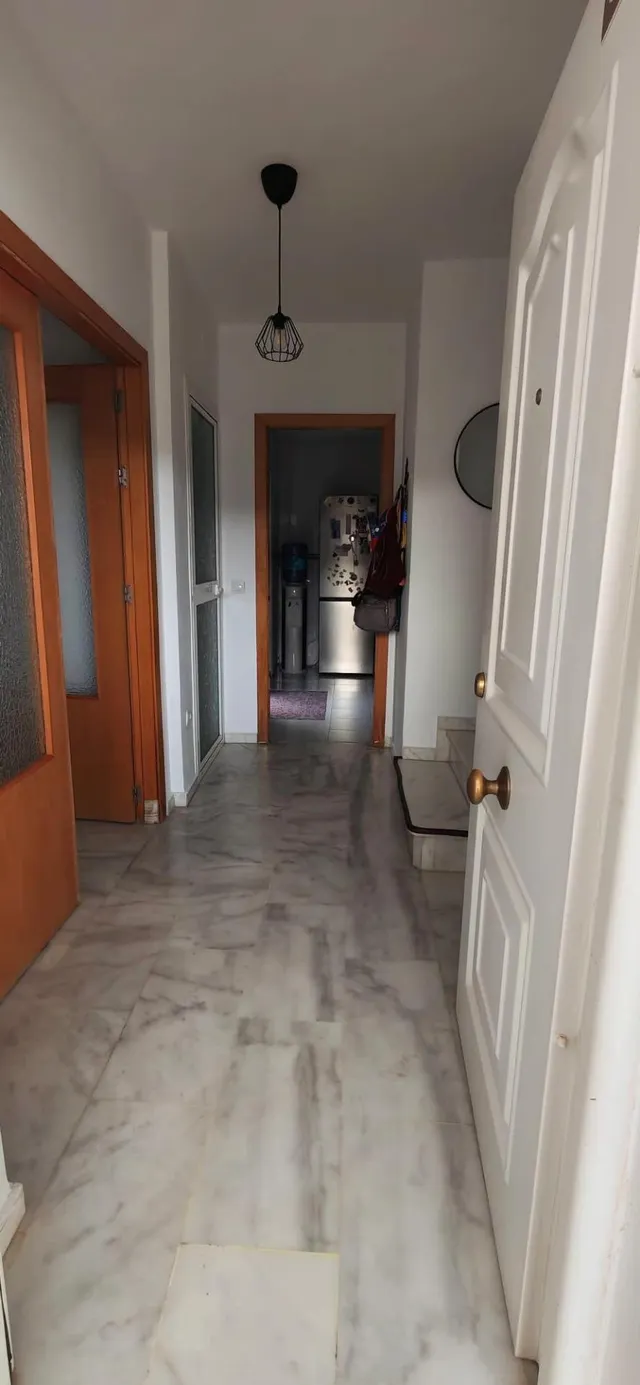 Casa de esquina con patio y chimenea en Villaverde del Río — 25
