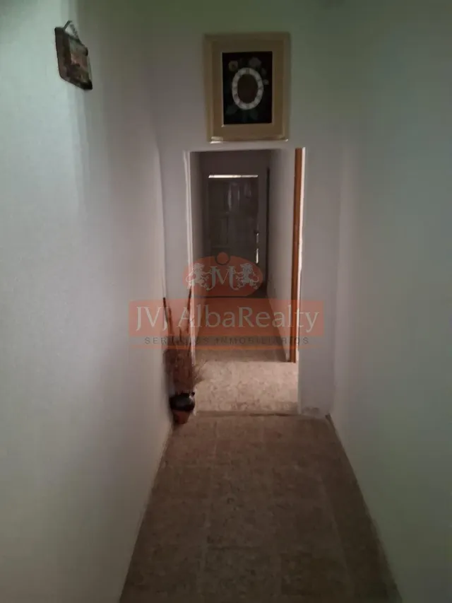 SE VENDE CASA CON PATIO EN LOS ANGUIJES. — 12