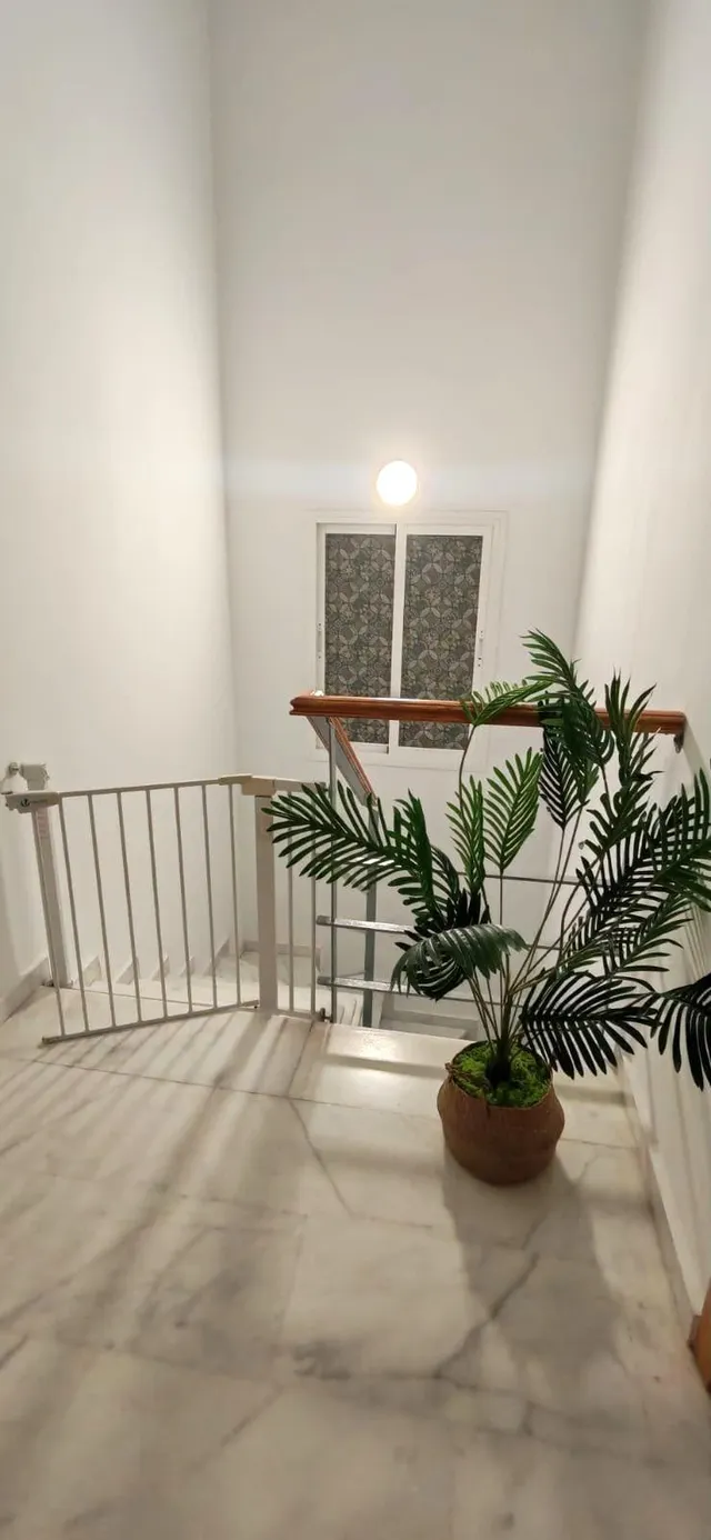 Casa de esquina con patio y chimenea en Villaverde del Río — 18