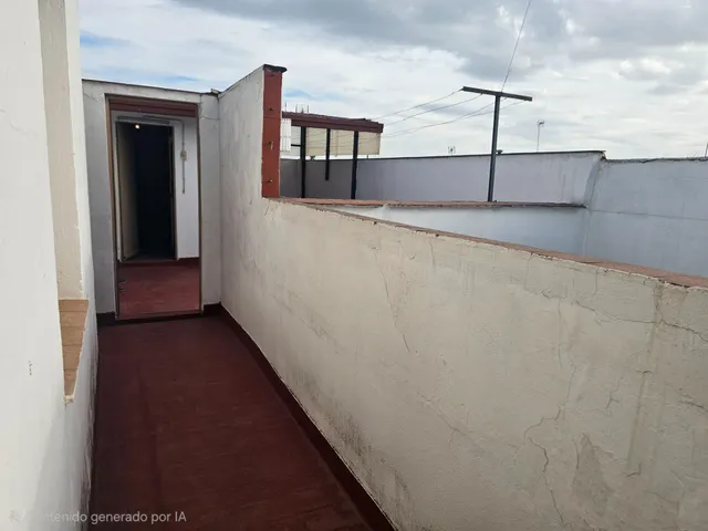 Piso de 4 dormitorios con plaza de garaje en San Basilio, con terraza de 20 m2 anexa al trastero en la cubierta. — 43