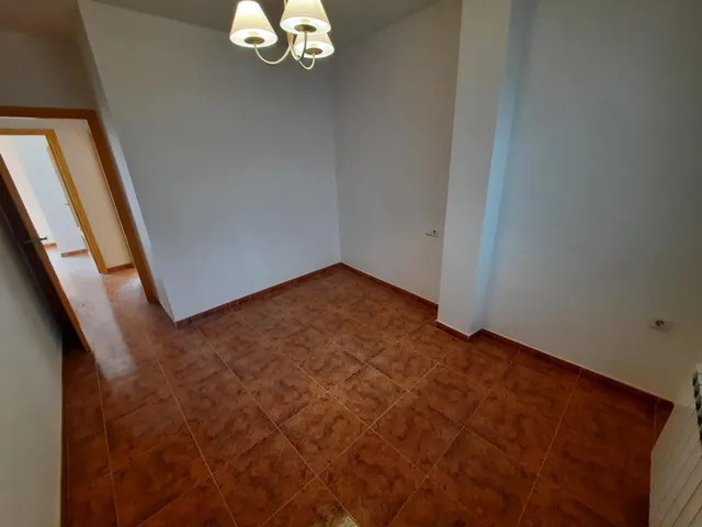 VIVIENDA EN PLANTA BAJA — 12