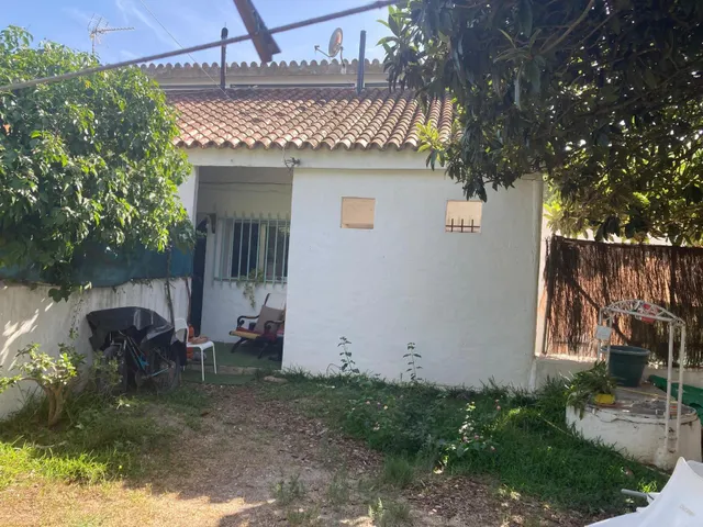 PARCELA CON TRES APARTAMENTOS — 25