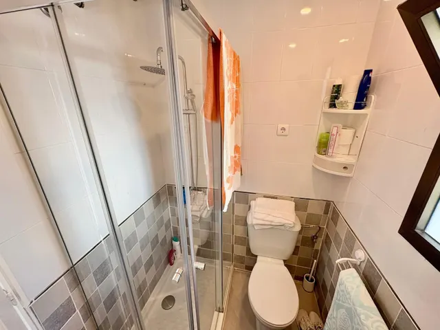 Casa adosada con dos patios privados y piscina comunitaria en Caleta de Vélez — 23