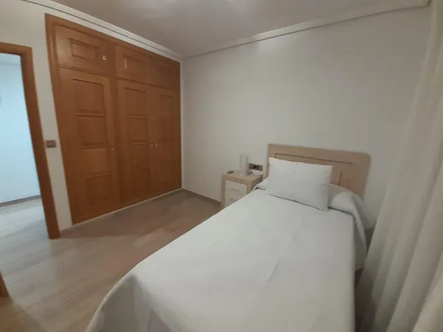 ESPECTACULAR PISO DE ALQUILER CON GRAN PATIO PRIVADO, PISCINA, COCHERA Y TRASTERO — 8